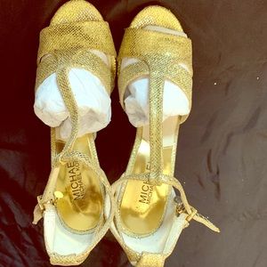 Gently Used Michael Kors Golden stilettos, 7M